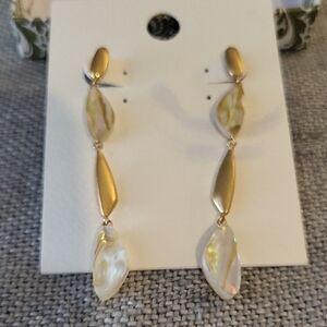 Kendra Scott Gold Three-tiered Drop Earrings with Ivory Mother of Pearl Stones.